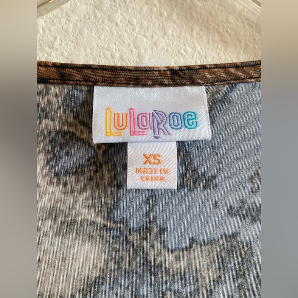 LuLaRoe Brown and Black Patterned Michelle Wrap Dress - Picture 2 of 8